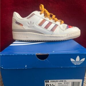 adidas women’s White Sneakers with Yellow Laces and Multicolor Stripe Detail